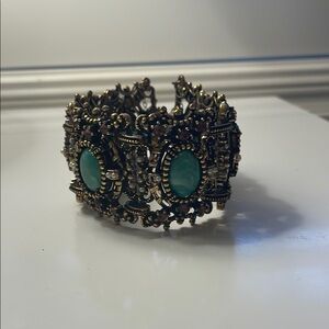 Elegant Gold and Green Bracelet